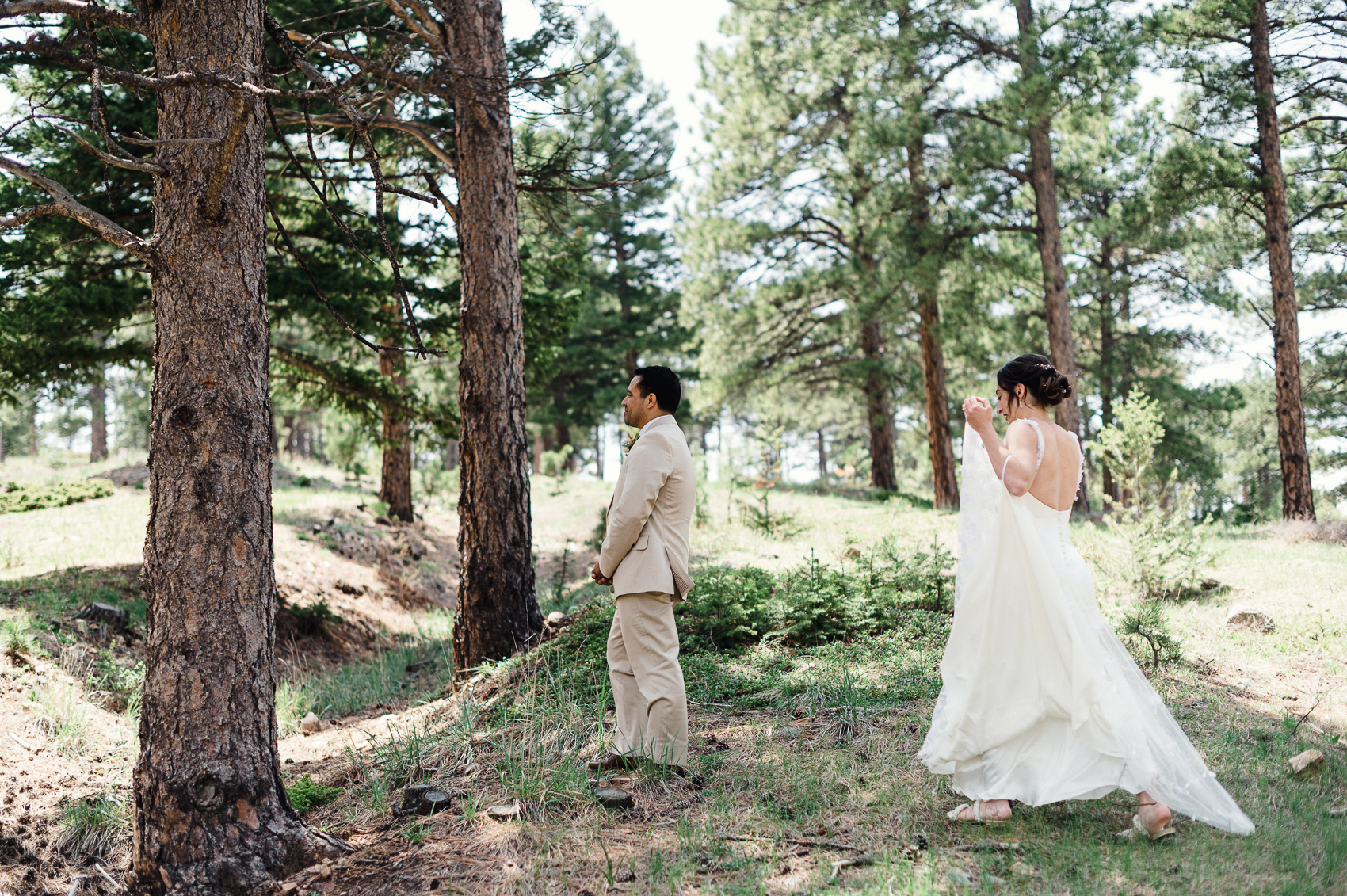 The sun setting over the breathtaking landscape of Boulder, Colorado, casting a golden glow on the venue where the couple celebrated their special day.