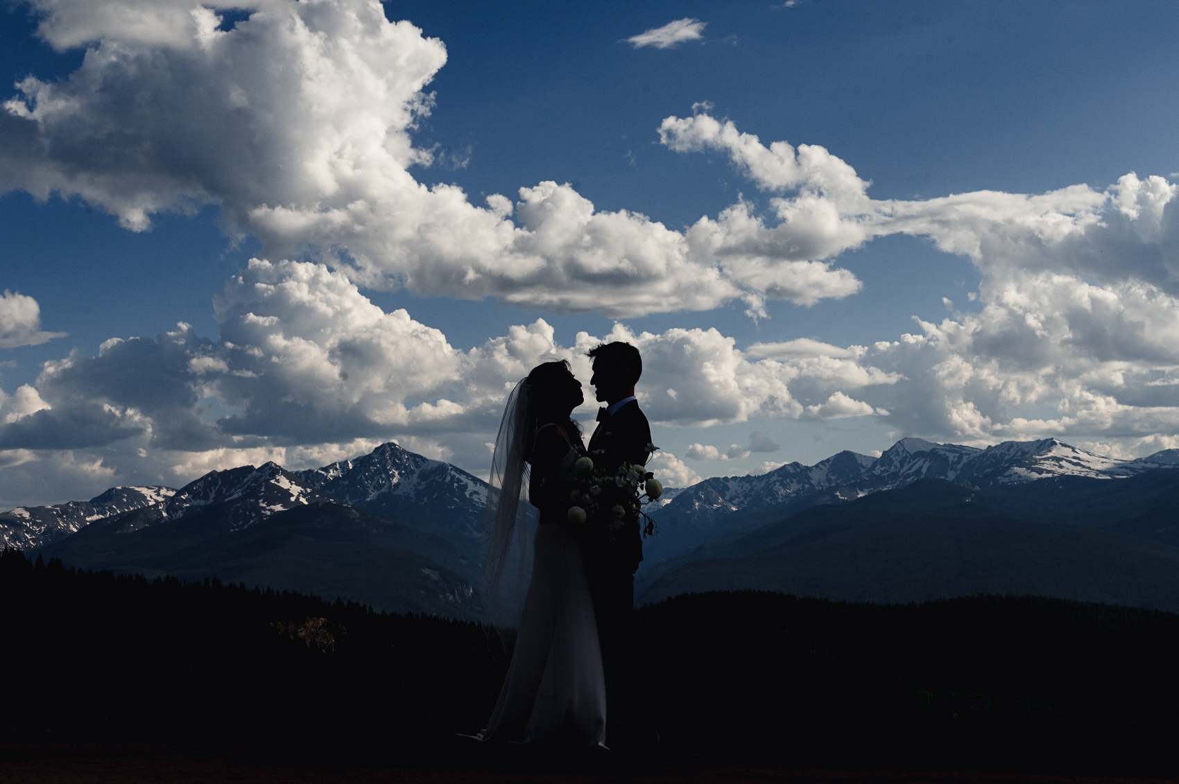 Couples photos during their wedding at The 10th Vail