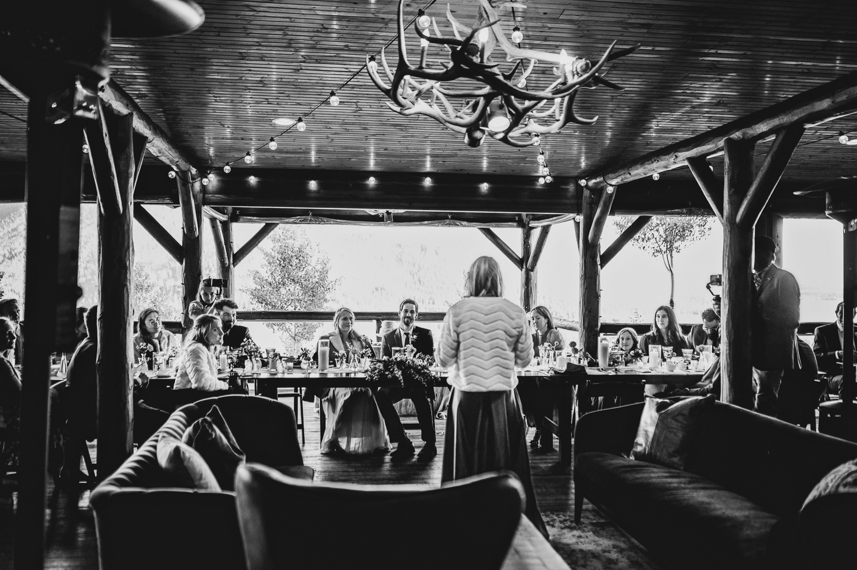 An outdoor wedding reception on the deck of Grand Lake Lodge.